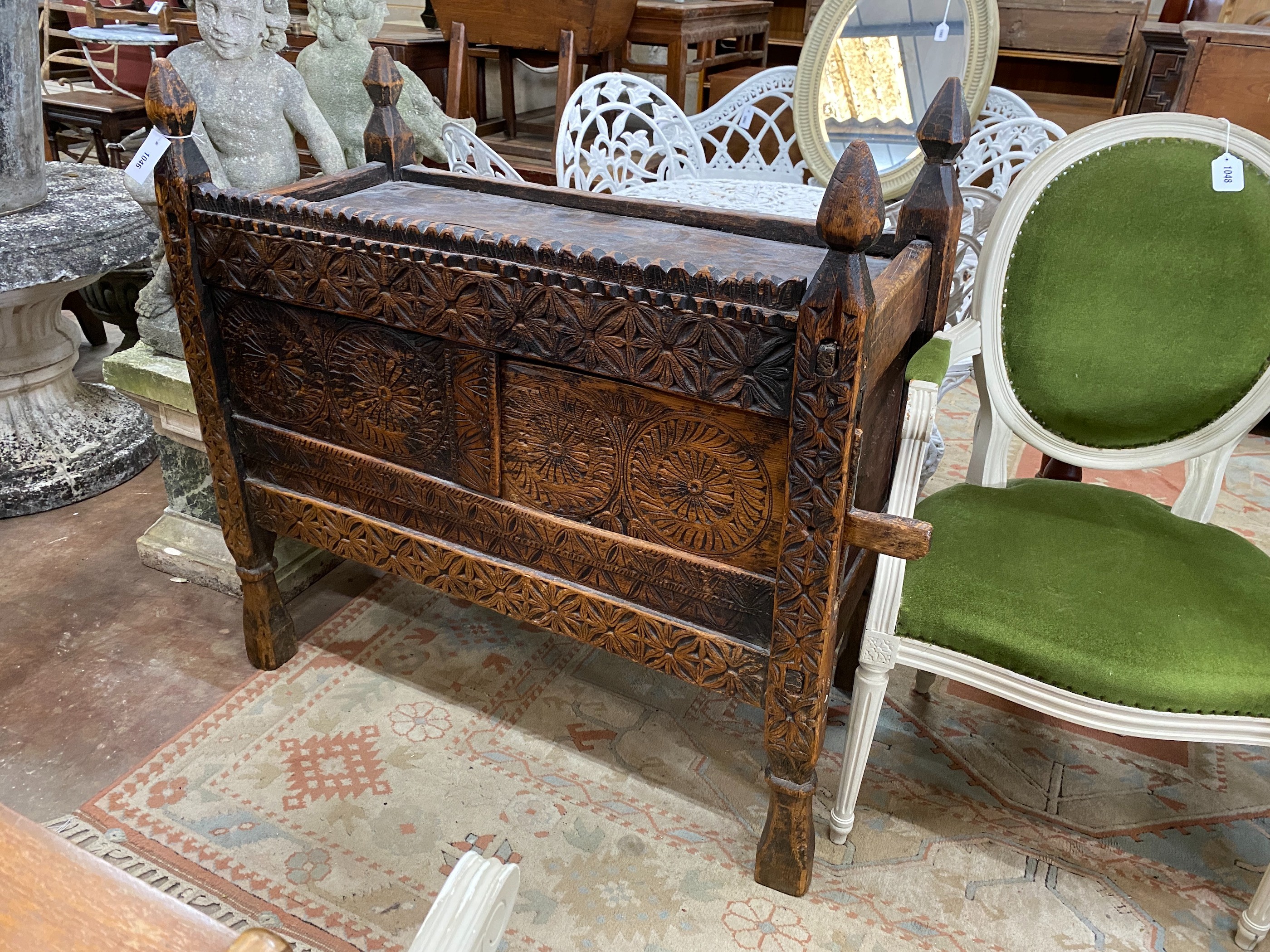 An Afghan chip carved hardwood chest, width 101cm, depth 52cm, height 100cm